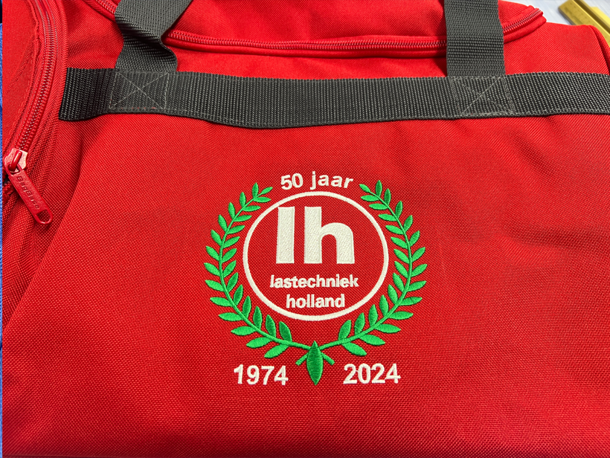 Lastechniek-Holland IJsselstein handdoeken borduren reistassen relatiegeschenk Daisy reclame1
